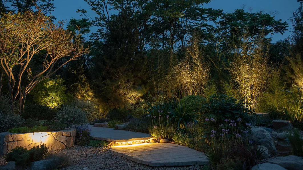 Landscape lighting projects with linear in-ground light and spot lights