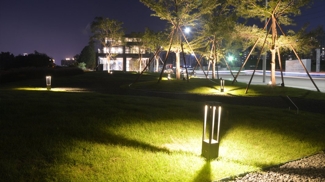 Landscape lighting projects with modern bollard lawn lights.